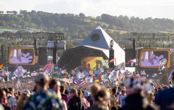 The crowd gathers to watch Elton John perform on the main Pyramid Stage on Day 5 of the Glastonbury Festival 2023