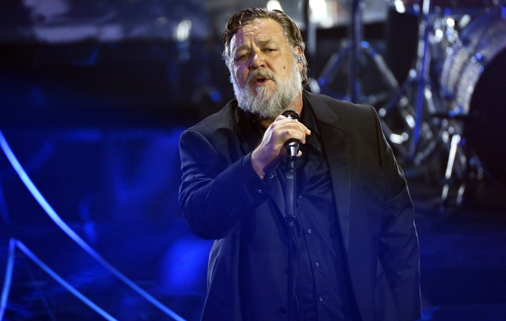 Russell Crowe performing live on stage